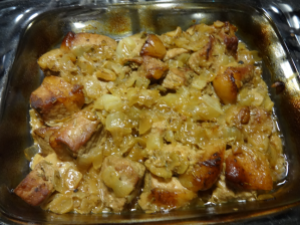 Baked Meat and Onions in Casserole Dish.